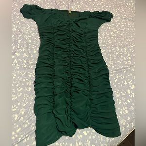 I’m selling this beautiful green dress it’s only worn once